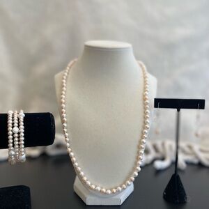 Natural pearl set. White and cream. Includes 24” necklace, bracelet, earrings